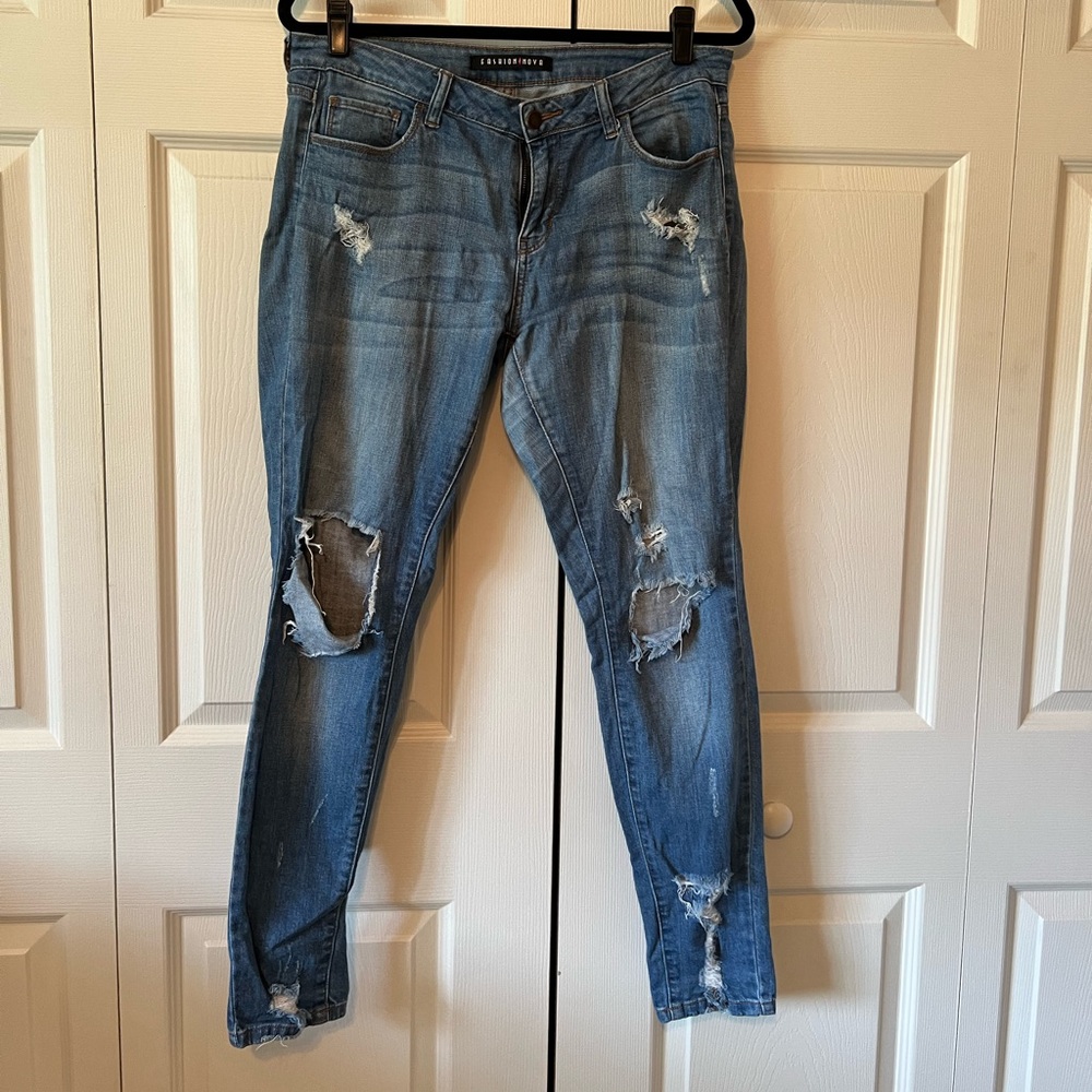 Medium wash jeans low rise distressed